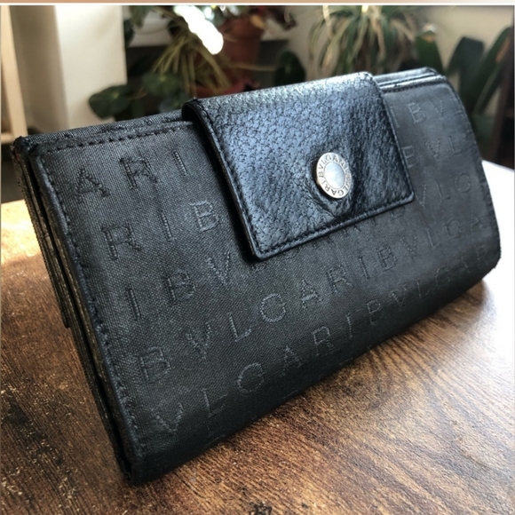 BVLGARI Handbags - Bulgari trifold wallet-Newly restored authentic black Bulgari *HOST PICK*